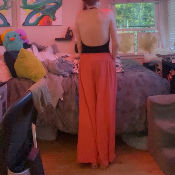 Elegant Black Top with Flowing Coral Pants - Picture 12 of 17
